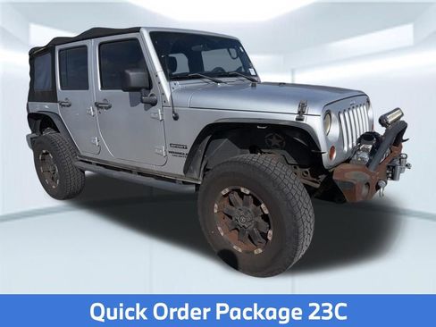 Used 2012 Jeep Wrangler Unlimited Sport AWD/4WD image 2