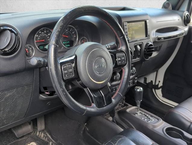 Used 2012 Jeep Wrangler Unlimited Sahara AWD/4WD image 9