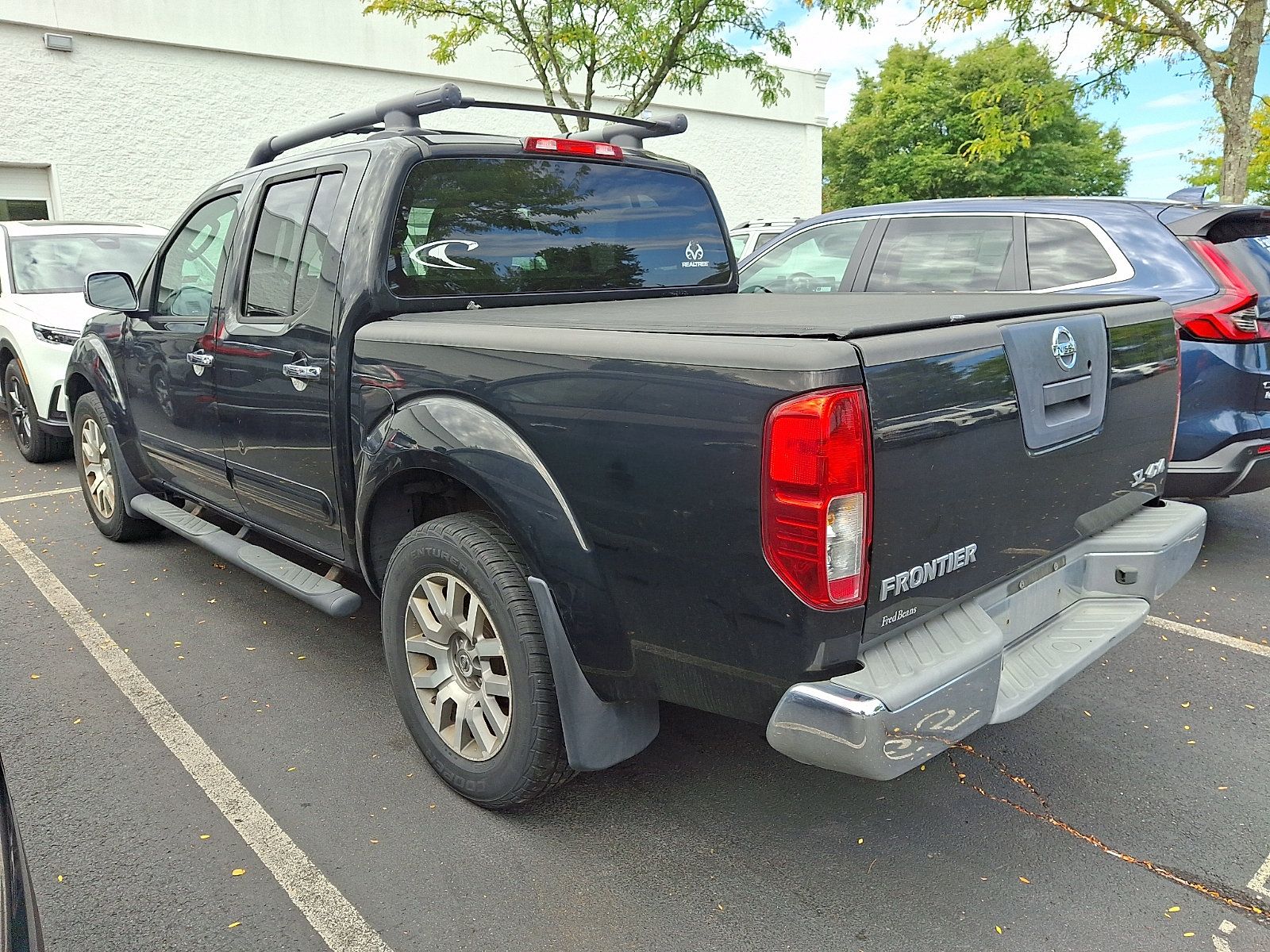 Used 2011 Nissan Frontier SL AWD/4WD image 3