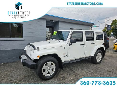 Used 2012 Jeep Wrangler Unlimited Sahara w/ Dual Top Group image 1