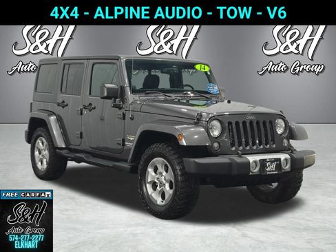 Used 2014 Jeep Wrangler Unlimited Sahara AWD/4WD image 1