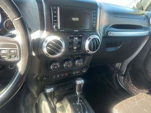 Used 2013 Jeep Wrangler Unlimited Sahara w/ Dual Top Group image 12