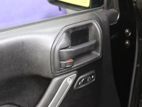 Used 2014 Jeep Wrangler Unlimited Sahara w/ Dual Top Group AWD/4WD image 11