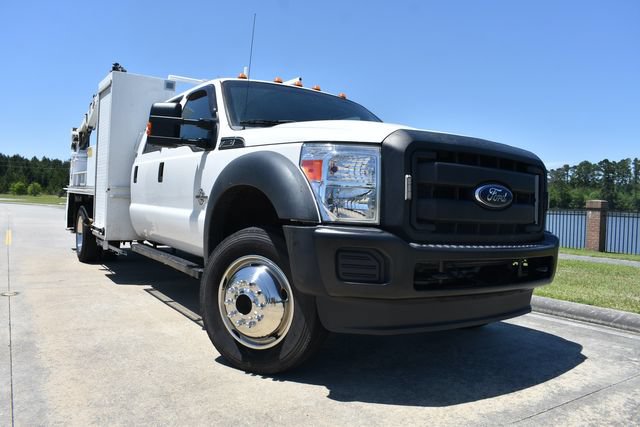 Used 2013 Ford F550 4x4 Crew Cab Super Duty w/ Payload Upgrade Pkg image 1