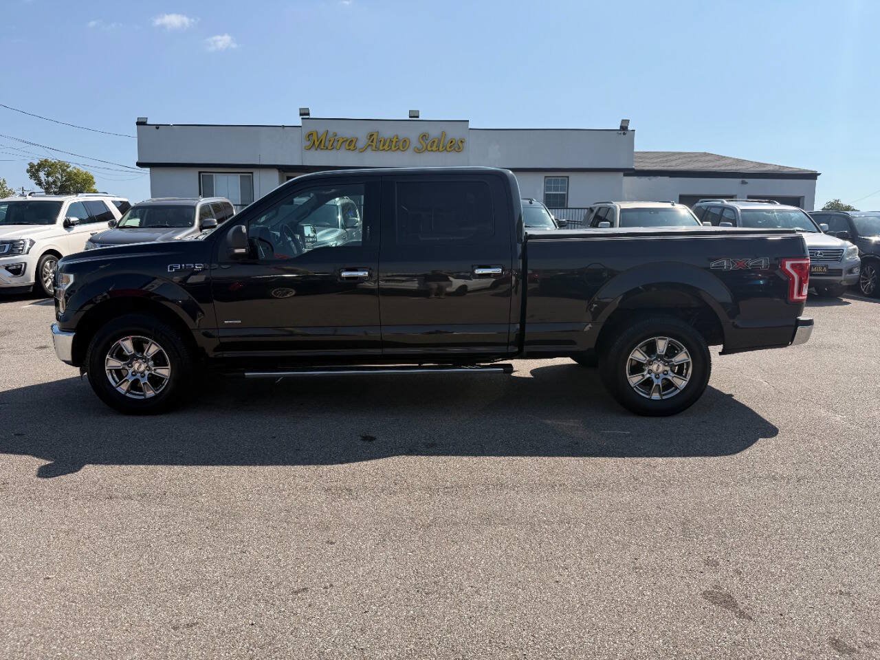 Used 2015 Ford F150 XLT w/ Equipment Group 302A Luxury AWD/4WD image 1
