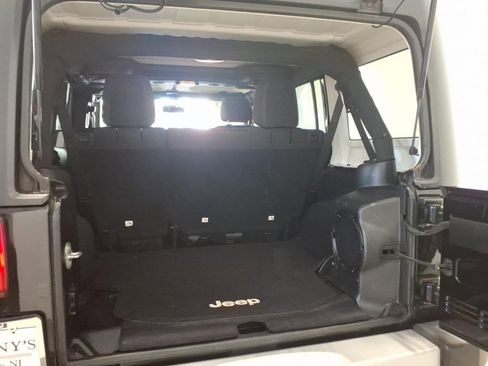 Used 2013 Jeep Wrangler Unlimited Sahara w/ Dual Top Group AWD/4WD image 19