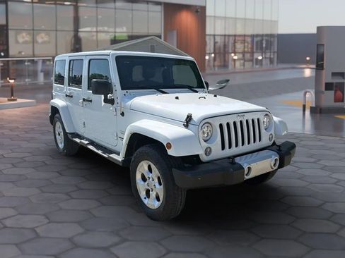 Used 2015 Jeep Wrangler Unlimited Sahara w/ Mopar Chrome Edition Group AWD/4WD image 21