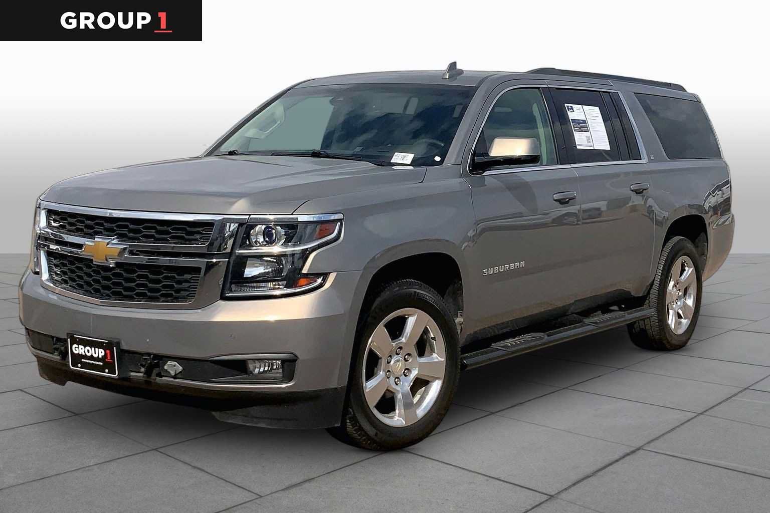 Used 2017 Chevrolet Suburban LT w/ Luxury Package AWD/4WD image 1