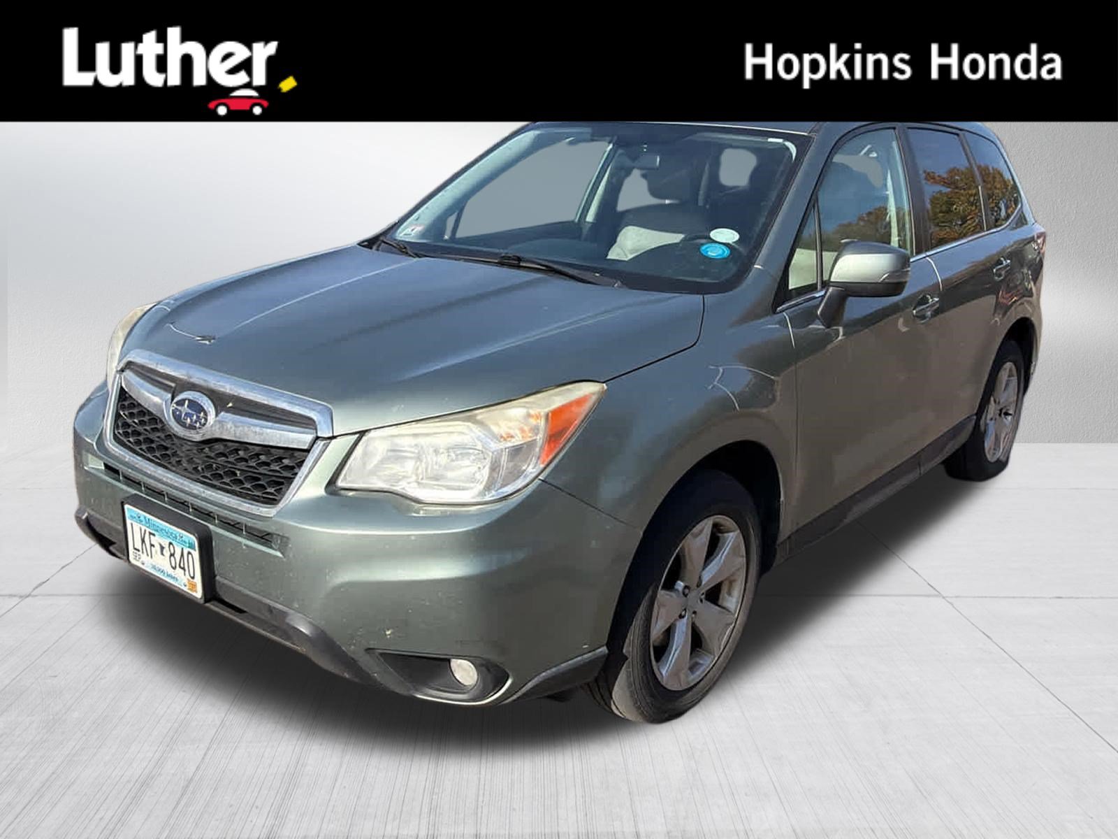 Used 2014 Subaru Forester 2.5i Touring AWD/4WD image 1