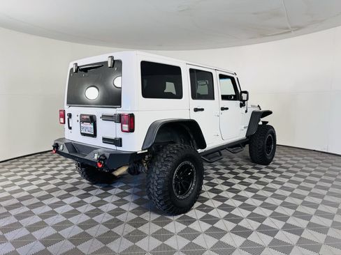 Used 2015 Jeep Wrangler Unlimited Rubicon w/ Dual Top Group AWD/4WD image 22