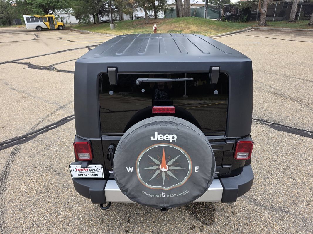 Used 2010 Jeep Wrangler Unlimited Sahara w/ Dual Top Group AWD/4WD image 6