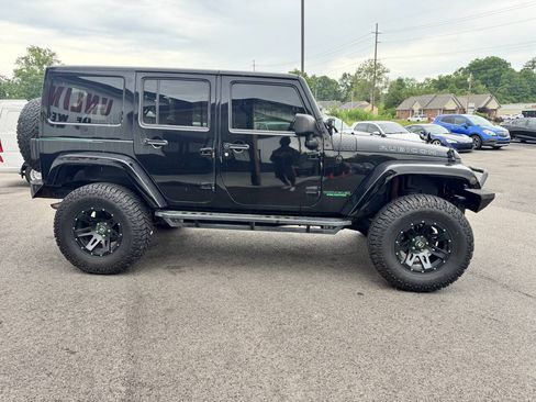 Used 2014 Jeep Wrangler Unlimited Rubicon w/ Dual Top Group AWD/4WD image 6