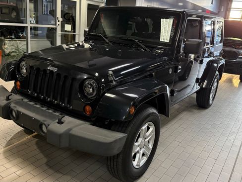 Used 2012 Jeep Wrangler Unlimited Sahara AWD/4WD image 1