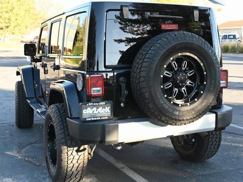 Used 2015 Jeep Wrangler Unlimited Sahara w/ Dual Top Group AWD/4WD image 9