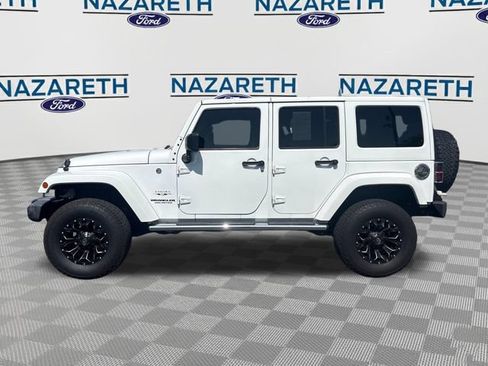 Used 2016 Jeep Wrangler Unlimited Sahara w/ Mopar Chrome Edition Group AWD/4WD image 4