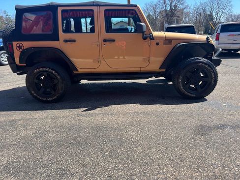 Used 2013 Jeep Wrangler Unlimited Sport w/ Mopar Black Appearance Group image 25