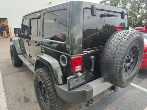 Used 2011 Jeep Wrangler Unlimited Sahara w/ Dual Top Group AWD/4WD image 6