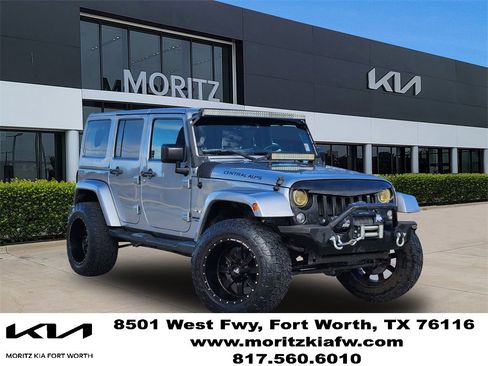 Used 2016 Jeep Wrangler Unlimited Sahara image 1