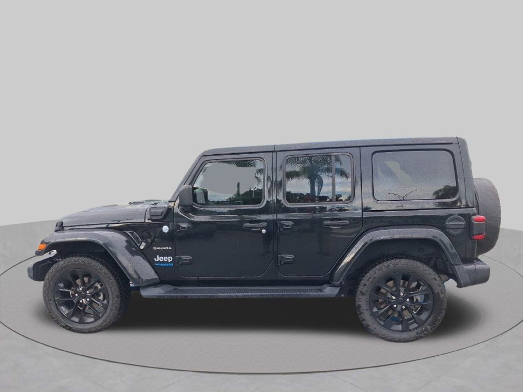 Used 2021 Jeep Wrangler Unlimited Sahara w/ Cold Weather Group AWD/4WD image 11