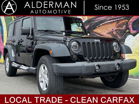 Used 2012 Jeep Wrangler Unlimited Sport image 1