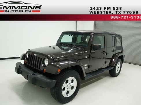 Used 2013 Jeep Wrangler Unlimited Sahara AWD/4WD image 1