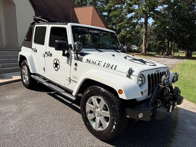 Used 2013 Jeep Wrangler Unlimited Sahara w/ Dual Top Group AWD/4WD image 11