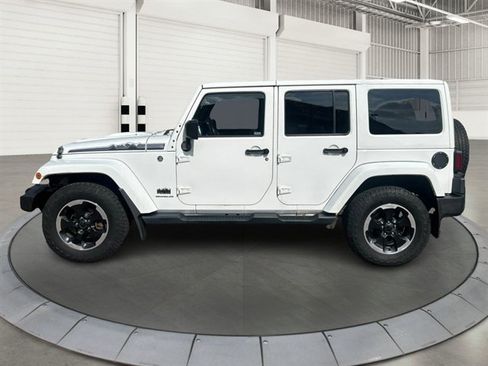 Used 2014 Jeep Wrangler Unlimited Sahara w/ Dual Top Group AWD/4WD image 1