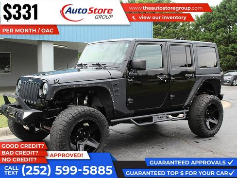 Used 2012 Jeep Wrangler Unlimited Rubicon w/ Connectivity Group AWD/4WD image 2