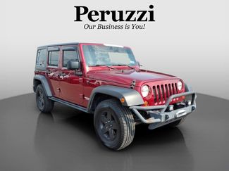 Used 2012 Jeep Wrangler Unlimited Sport AWD/4WD video 1