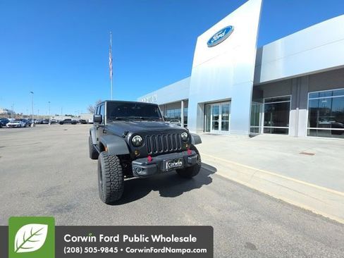 Used 2016 Jeep Wrangler Unlimited Rubicon w/ Dual Top Group image 1