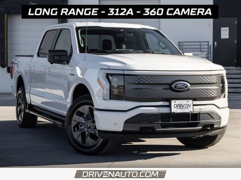 Used 2023 Ford F150 Lightning XLT w/ Equipment Group 312A High image 1