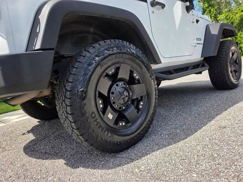 Used 2013 Jeep Wrangler Sport w/ Mopar Black Appearance Group image 12