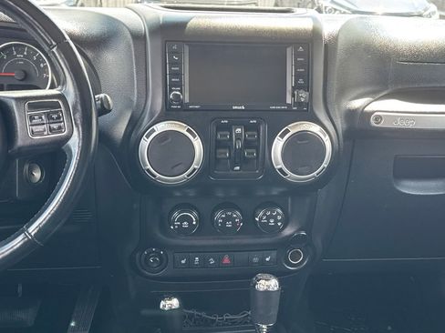 Used 2013 Jeep Wrangler Unlimited Sahara w/ Dual Top Group AWD/4WD image 17
