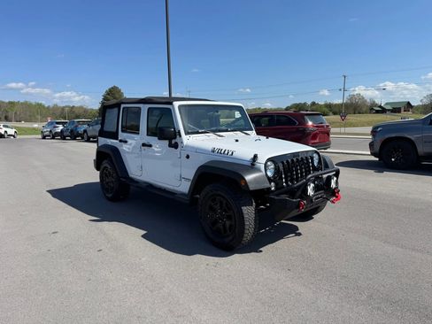 Used 2015 Jeep Wrangler Unlimited Sport image 1