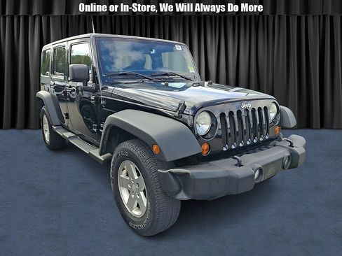 Used 2011 Jeep Wrangler Unlimited Sport AWD/4WD image 1