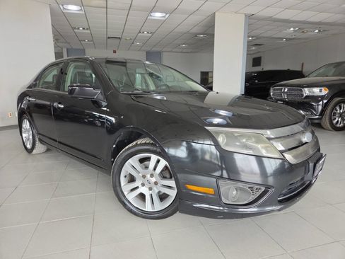 Used 2012 Ford Fusion SEL w/ Luxury Pkg FWD image 1