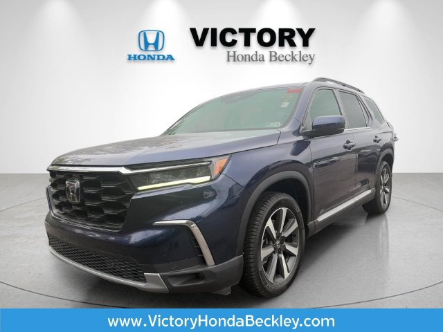 Used 2025 Honda Pilot Touring image 1