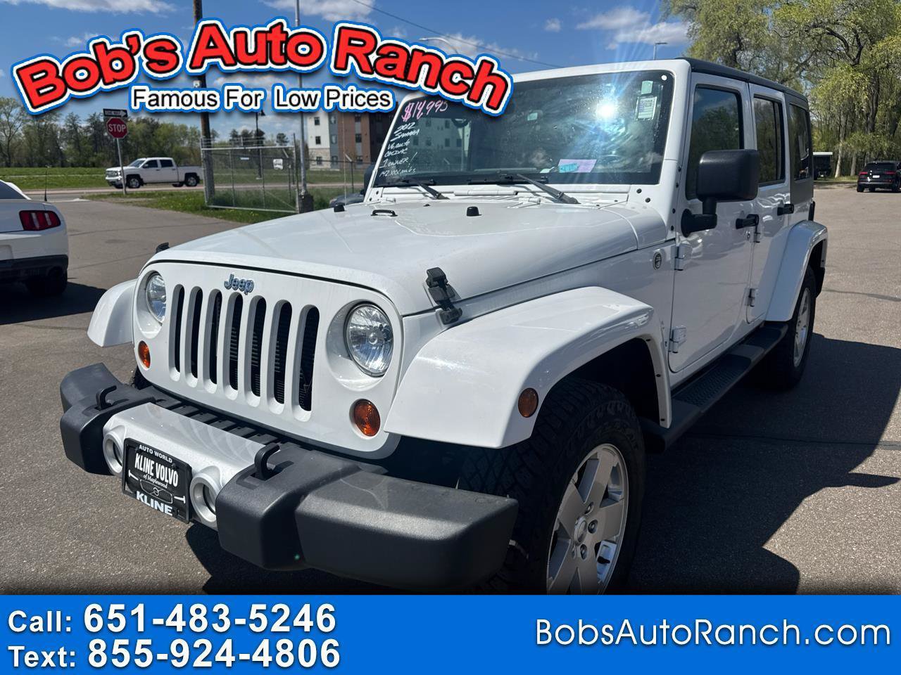 Used 2012 Jeep Wrangler Unlimited Sahara w/ Dual Top Group AWD/4WD image 1