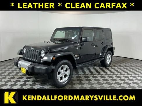 Used 2014 Jeep Wrangler Unlimited Sahara AWD/4WD image 1