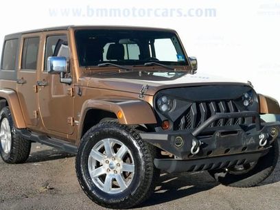 Used 2011 Jeep Wrangler Unlimited 70th Anniversary w/ Dual Top Group