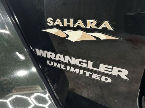 Used 2012 Jeep Wrangler Unlimited Sahara w/ Dual Top Group AWD/4WD image 11
