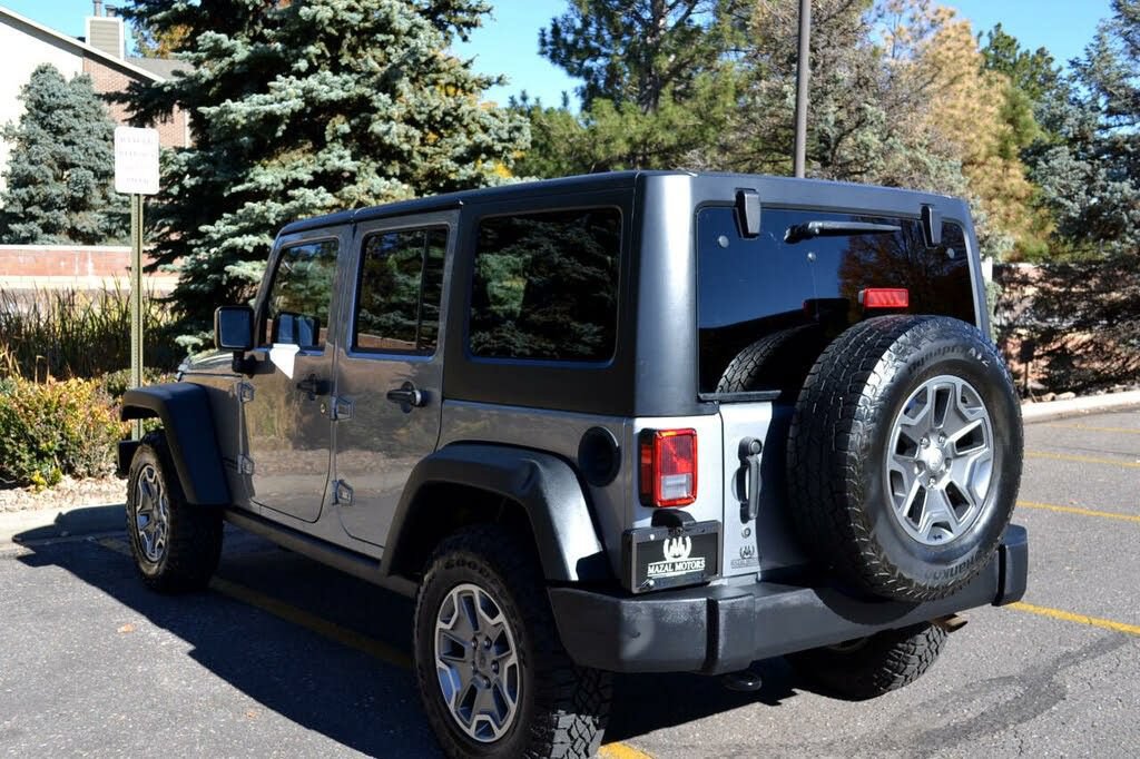 Used 2015 Jeep Wrangler Unlimited Rubicon w/ Dual Top Group AWD/4WD image 14