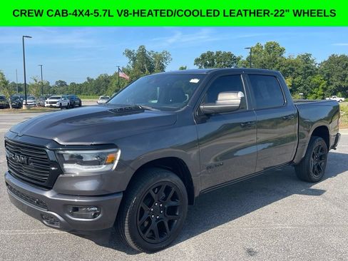 Used 2024 RAM 1500 Laramie AWD/4WD image 1