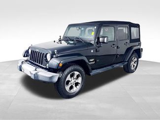Used 2015 Jeep Wrangler Unlimited Sahara w/ Max Tow Package AWD/4WD video 1