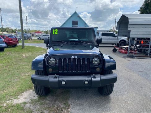 Used 2012 Jeep Wrangler Unlimited Sahara w/ Dual Top Group AWD/4WD image 3
