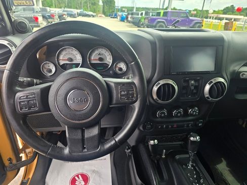 Used 2014 Jeep Wrangler Unlimited Rubicon w/ Dual Top Group AWD/4WD image 7