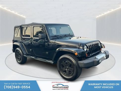 Used 2012 Jeep Wrangler Unlimited Sahara w/ Connectivity Group AWD/4WD image 3