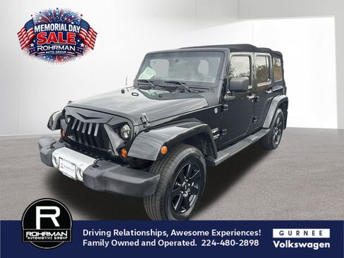 Used 2011 Jeep Wrangler Unlimited Sahara w/ Dual Top Group AWD/4WD image 1