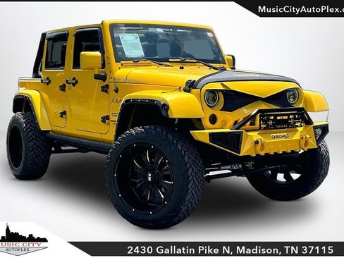Used 2011 Jeep Wrangler Unlimited Sport AWD/4WD image 1