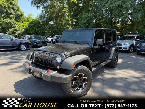 Used 2014 Jeep Wrangler Unlimited Sport w/ Quick Order Package 24S AWD/4WD image 1